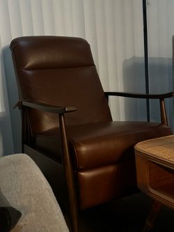 Brown leather recliner chair