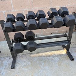 30-40-50-60 pounds hex rubber coated dumbbells in like new condition with heavy duty rack