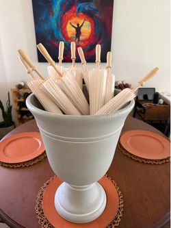 Resin urn and 9  paper parasols for wedding