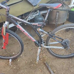 Giant Vt Three 21 Speed And  Specialized Stump Jumper.