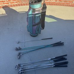 Golf clubs w FILA carry bag