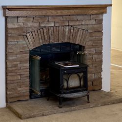Stone fireplace pad and stone fireplace decor