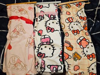 Hello Kitty and Pooh blankets