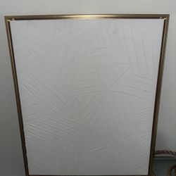 Modern textured wall artwork with gold frame