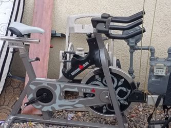 Bowflex, exercise bike, and treadmill.