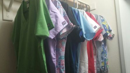 In good condition used scrub tops & pants