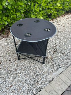 Tailgate table with cup holder