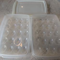 2 Egg storage containers each hold 24 eggs
