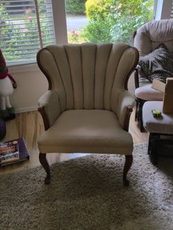 Antique arm chair cream brocade with wood detail