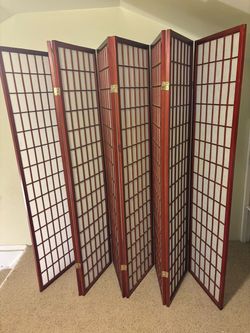 Cherry red colored paper and wooden Japanese folding dressing screen