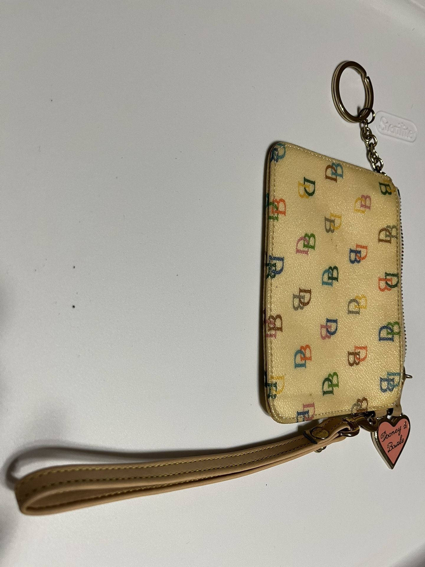 Dooney & Bourke Vintage Multi Colored Cream Wristlet $25