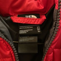 The North Face Jacket (kids). Normal Wear