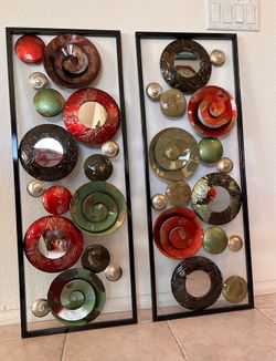 Set of 2 large modern abstract metal wall art pieces.