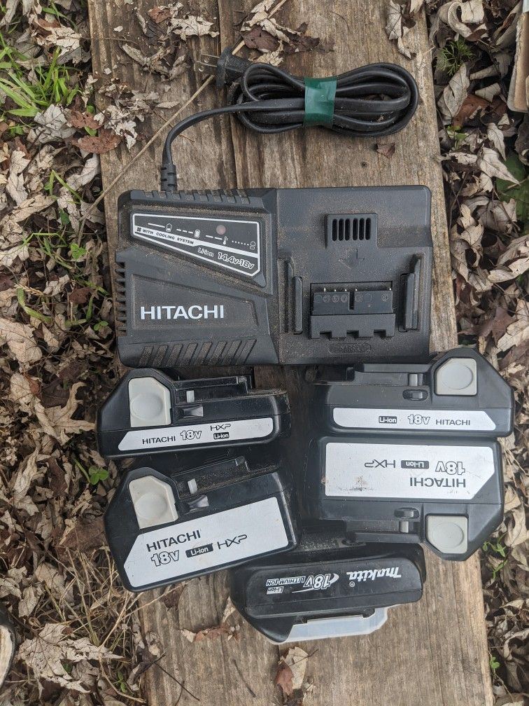 5 Hitachi Batteries And Charger 