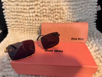 Sunglasses miu miu
