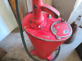 Vintage Red Cast Iron Oil Pump with Hose