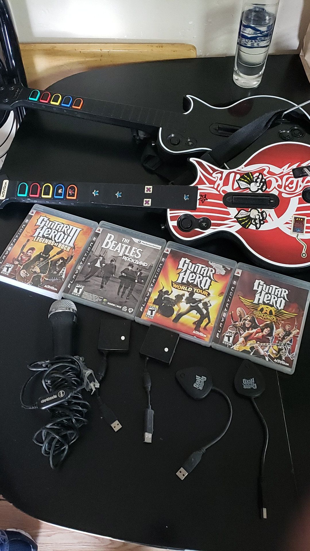 Ps3 Guitar hero everything works..2 guitars 1 mic all hardware and 4 games..