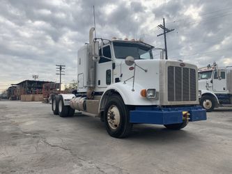 2011 PETERBILT 365 LOW MILES W DEF