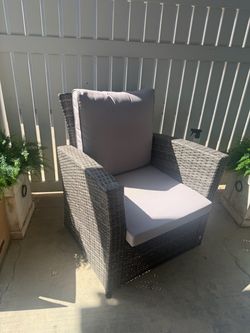 two patio chairs, and table