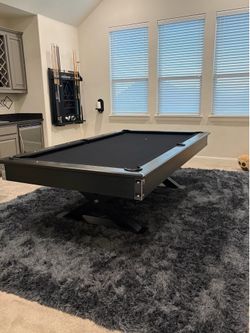 8-foot slate American Heritage pool table in very excellent condition, with an Imperial ping-pong conversion top