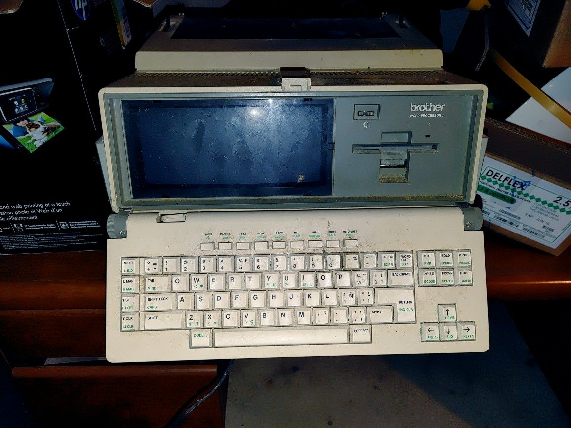 Old school floppy disk era and digital type writer