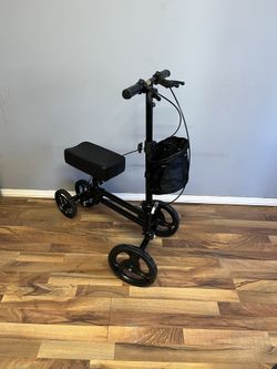 Elenker Knee Walker. ( Practically New)