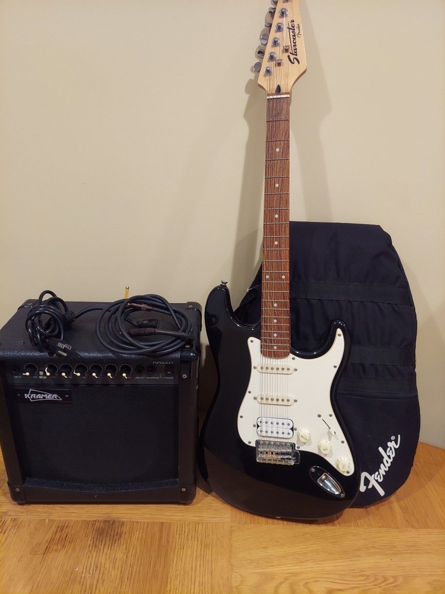 starcaster by Fender with amplifier 