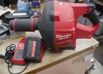 milwaukee drain snake m18 2772-20 W 48-59-1812 CHARGER AND 5AH BATTERY USED. TESTED. IN A GOOD WORKING ORDER.   NOTE - THE COIL HAS A KINK MIGHT NEED 