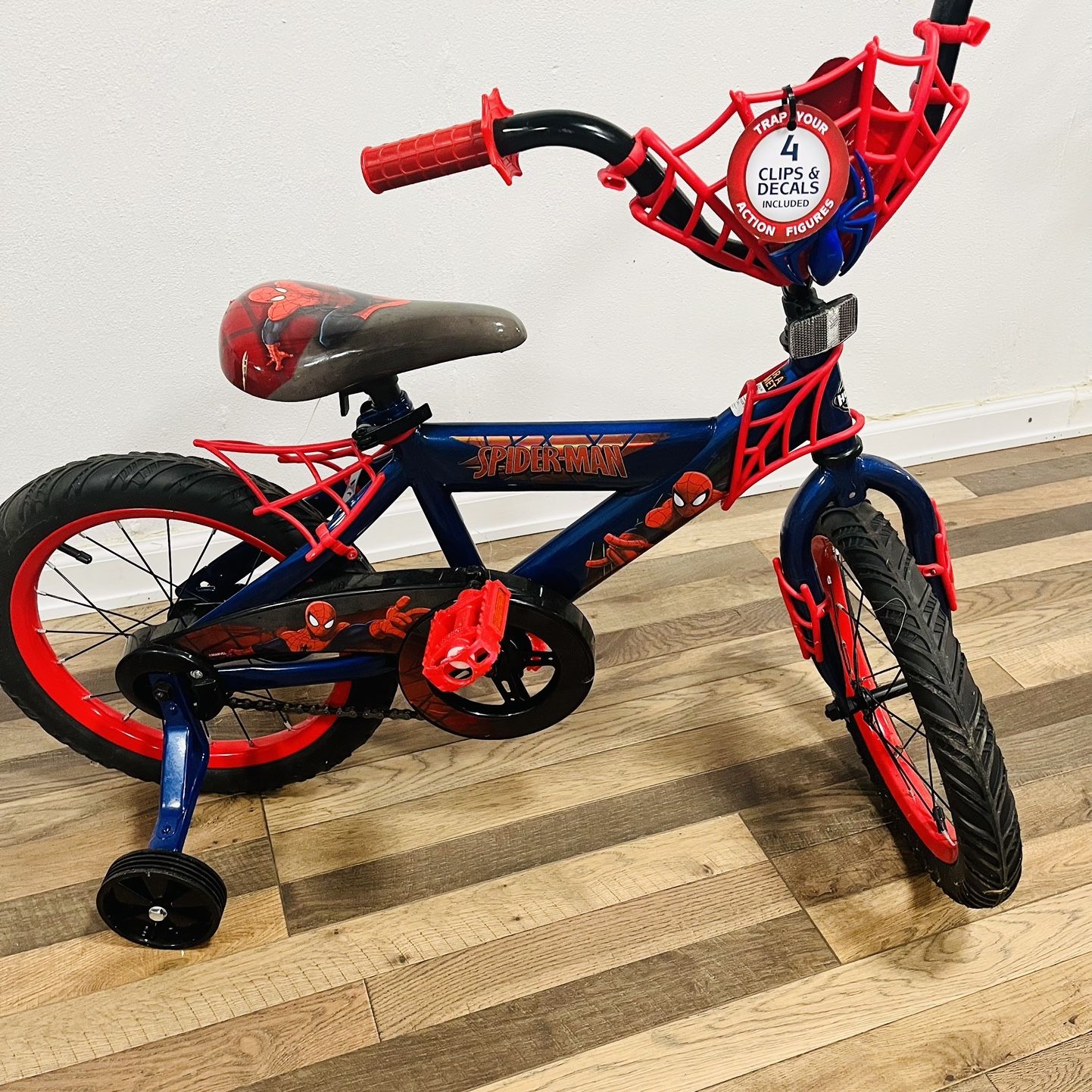 Huffy spiderman bike online trap your action figures