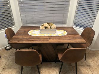 55”x32” dining table.