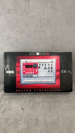 Korg synthesizer ER-1 with box and cord