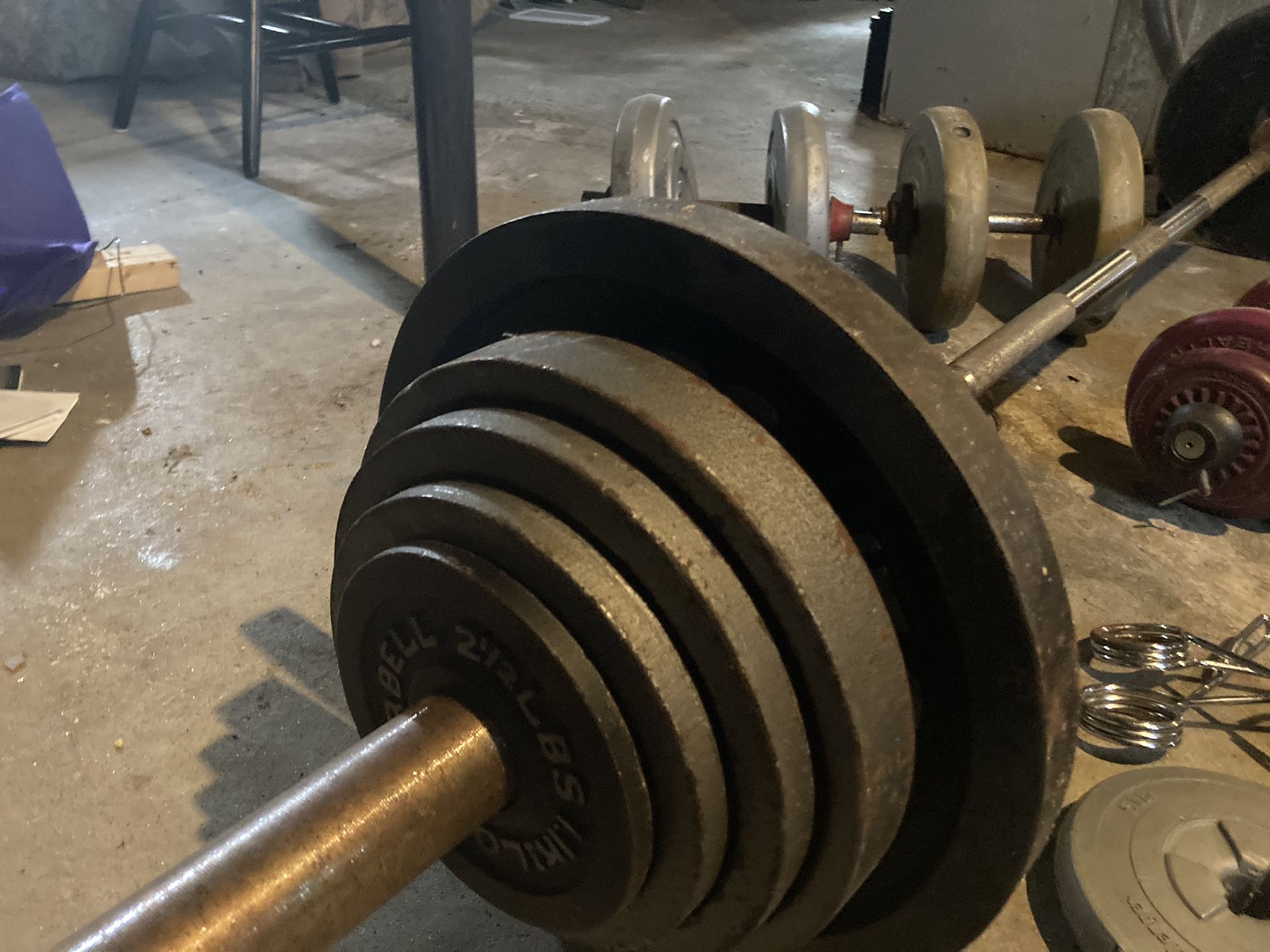 Steel weights Olympic bar, bench and miscellaneous other weights