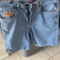 The styles feature a loose or baggy fit, typical of this brand's jorts (denim shorts). Composition: 100% cotton.