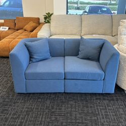 Display Blue Loveseat In Perfect Condition 