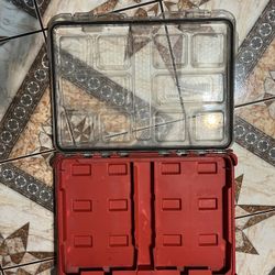 Milwaukee PACKOUT Organizer, a heavy-duty tool storage container designed for jobsite use. DOES NOT COMR WITH THE CONTAINERS INSIDE