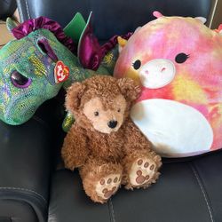 Two large stuffed animals, one vintage Mickey Mouse bear