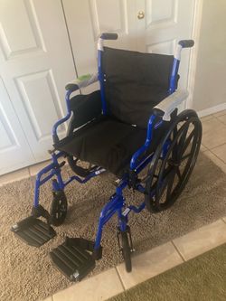 Wheelchair New With Footrests