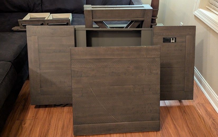 Grey desk with standing desk conversion section