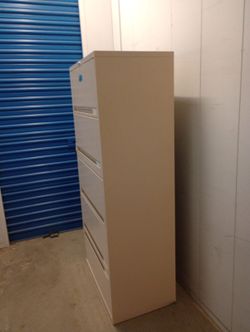 Metal file cabinet with key ideal for medical records