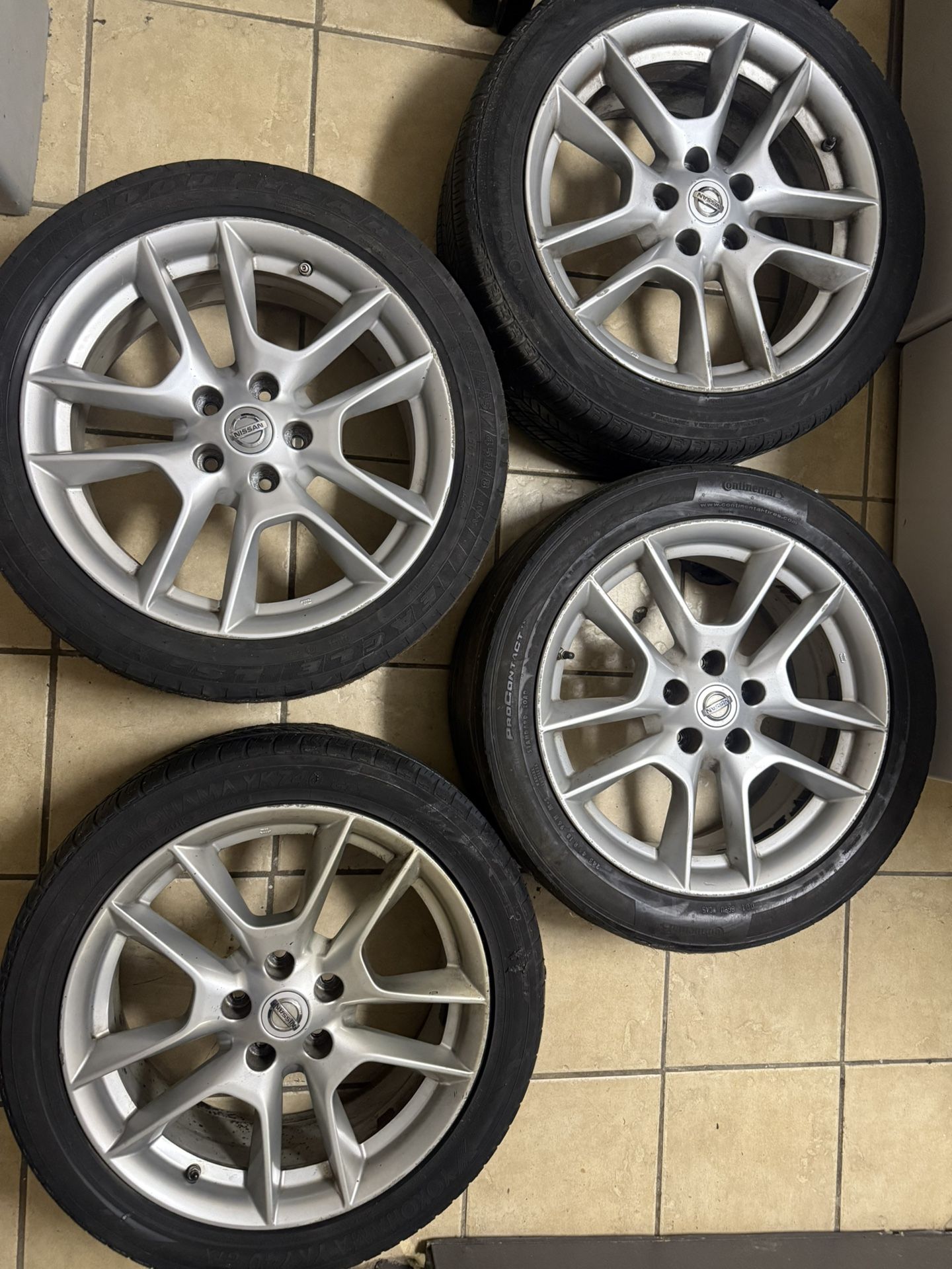 Nissan 18” 245 45 R 18 . . . . 4 Rims The tires are poor