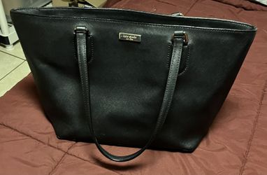 black tote bag by Kate Spade.