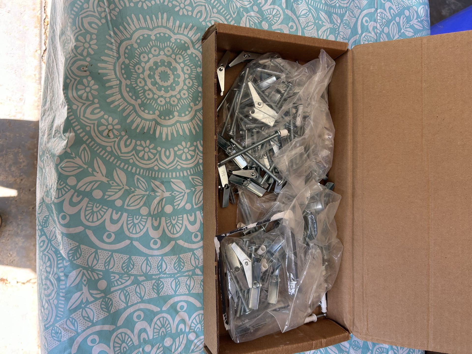 Box Of New Mollys And Toggles. 