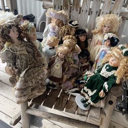 The Cathay Collection Dolls 1-5000 are limited edition, vintage porcelain dolls dating back to the 1990s. Each doll features a blonde, curly hair and 