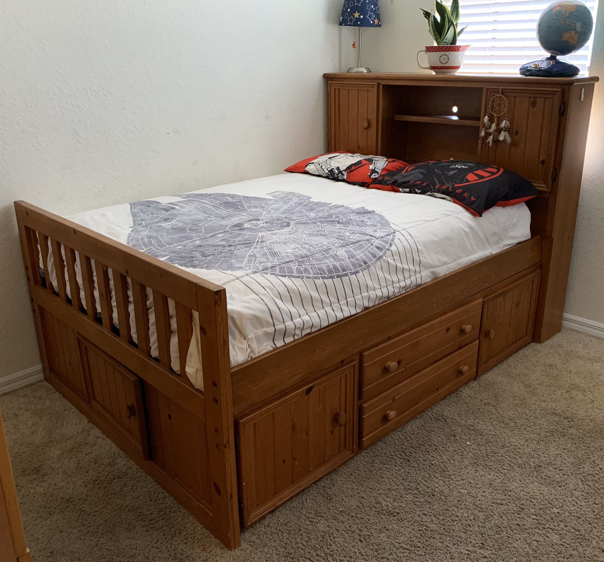 Full size captains bed with drawers and two book shelves