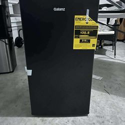 BRAND NEW MINI FRIDGE NEVER USED!