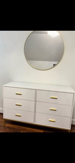 Full bed with dresser mirror and nightstand