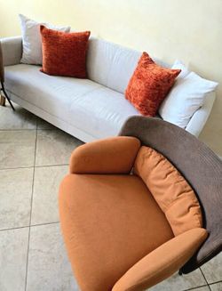 IKEA light gray Sofa and Two Yellow Accent Chairs