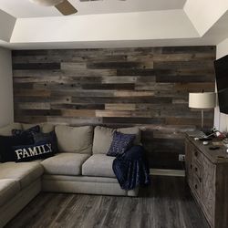 Reclaimed wood for accent walls. $7 per sq foot