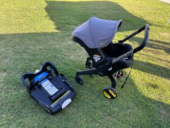 Doona carseat/stroller with base