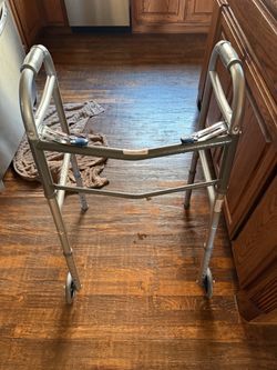 silver aluminum two-button folding medical walker up to 350 lbs